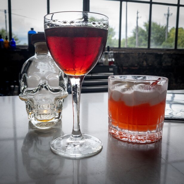 Food 2021 Event Horizon: bourbon, amaro, luxardo, absinthe, glitter, cherry smoke. South Florida Sin: Strawberry rhum, pineapple rum, canne, pina colada foam