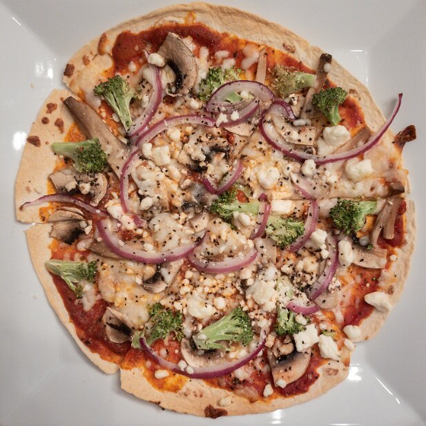Food 2021 Pizza! Tortilla, mushrooms, red onions, brocolli, feta cheese, mozarella cheese
